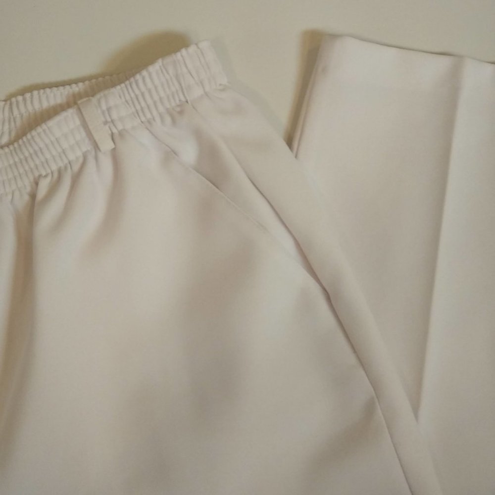Lady's Gently Used Off-white 100% Polyester Pants Size 14, the Brand is 24 K